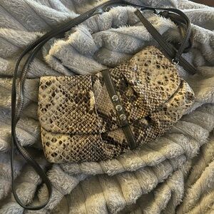 Leather strapless Brighton bag. Can be strapless, crossbody or wristlet